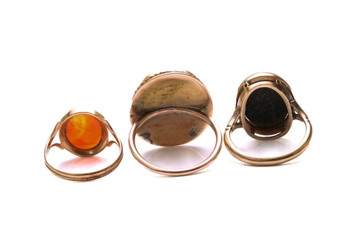 Lot 166 - Two cameo rings and an intaglio ring; to...