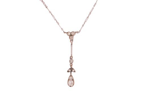 Lot 298 - A Belle Epoque drop necklace set with old-cut...