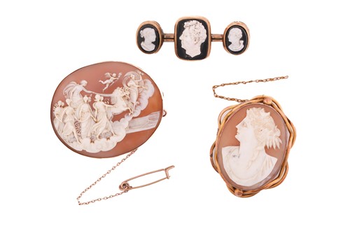 Lot 196 - Three cameo brooches; to include a shell cameo...