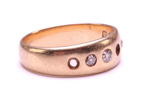 Lot 18 - An 18ct gold ring set with diamonds,...
