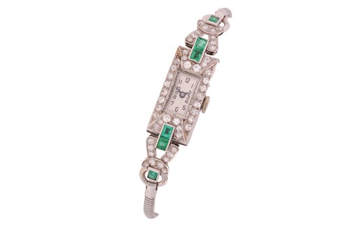 Lot 395 - An Art Deco lady's watch set with diamonds and...