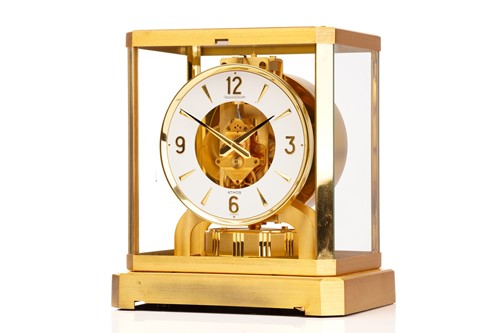 Lot 300 - A Jaeger LeCoultre brushed brass Atmos clock,...