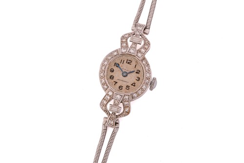 Lot 405 - An Art Deco Lady's dress watch, featuring a...