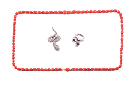 Lot 109 - A precious coral necklace, a serpent ring and...