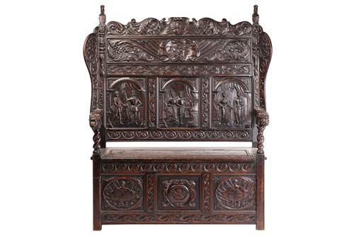 Lot 295 - A 19th-century "Jacobethan" box settle with...