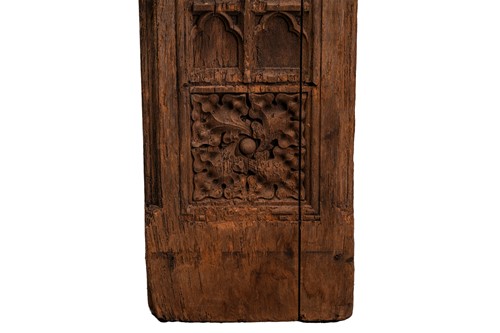Lot 159 - A carved oak choir or pew end, with a roundel...