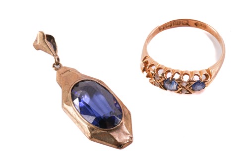 Lot 117 - A sapphire and diamond half hoop ring in 18ct...