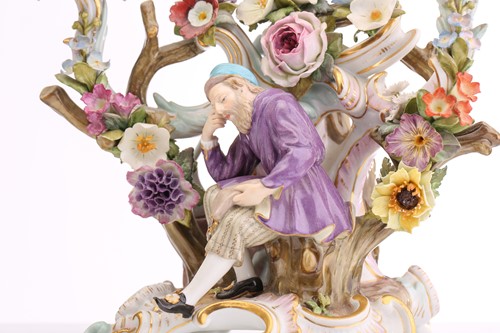 Lot 430 - A pair of Meissen three branch candelabra,...