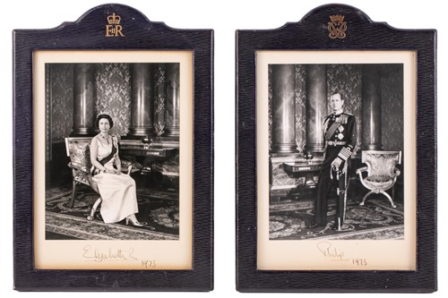 Lot 466 - A pair of signed photographs of HM Queen...