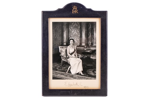 Lot 466 - A pair of signed photographs of HM Queen...