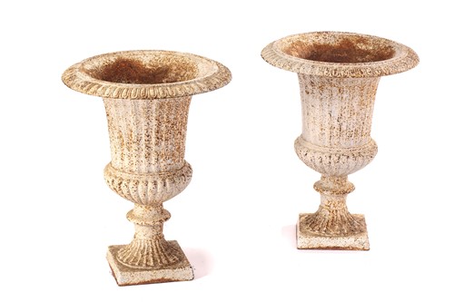 Lot 296 - A pair of Campagna form cast iron urns, 20th...