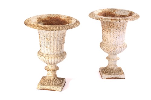 Lot 296 - A pair of Campagna form cast iron urns, 20th...