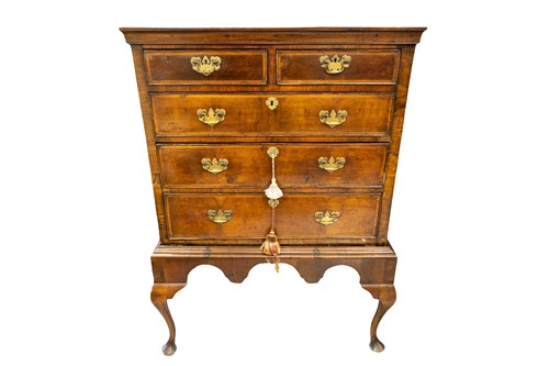 Lot 251 - A George II walnut chest on later stand, the...