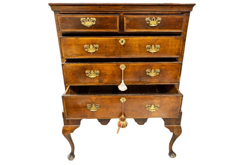 Lot 251 - A George II walnut chest on later stand, the...