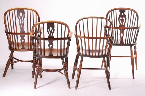 Lot 254 - A group of four 19th-century Windsor elm and...