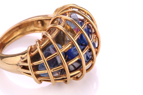Lot 197 - A 'caged' cocktail ring filled with...