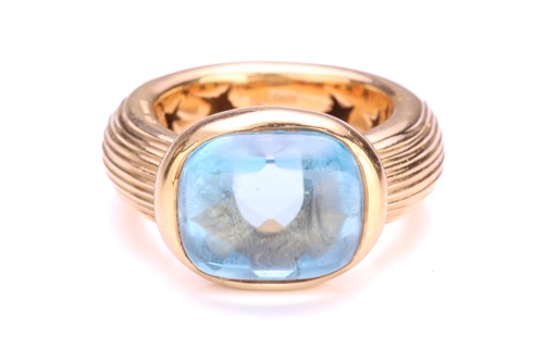 Lot 123 - A topaz dress ring in 18ct yellow gold,...