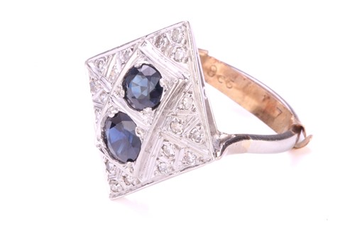 Lot 207 - A Sapphire and Diamond set panel ring,...