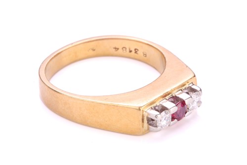 Lot 33 - A three-stone diamond and ruby ring in 18ct...