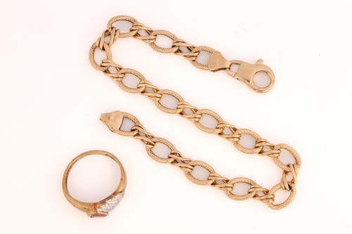 Lot 152 - A fancy link bracelet and a ring in 9ct yellow...