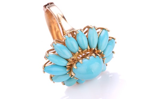 Lot 218 - A turquoise flowerhead ring, comprises a...