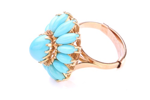 Lot 218 - A turquoise flowerhead ring, comprises a...