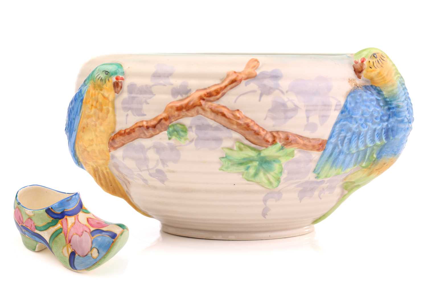 Lot 444 - A Clarice Cliff Fantasque design clog in a...
