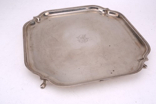 Lot 462 - An early 20th century square silver salver,...