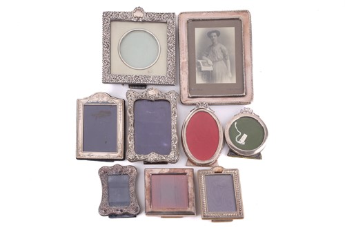 Lot 495 - An oval silver easel photograph frame,...