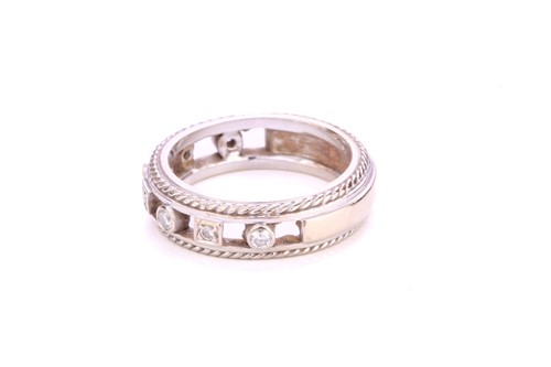Lot 252 - A diamond-set ring, containing circular-cut...