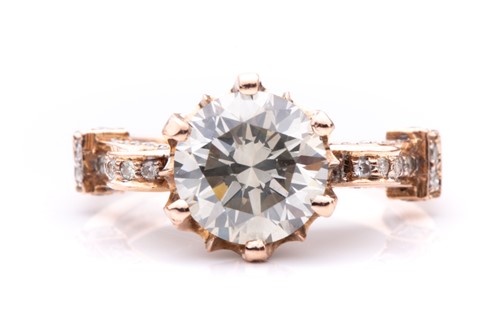 Lot 346 - A diamond dress ring, featuring a 2.70ct round...