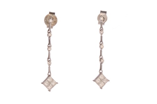 Lot 229 - A pair of diamond drop earrings in 18ct white...