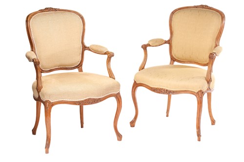 Lot 294 - A pair of Louis XV style walnut fauteuils,...