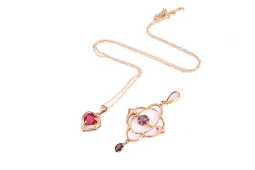 Lot 296 - A 9ct gold Edwardian pendant set with garnet,...