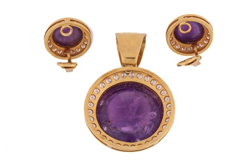 Lot 235 - An amethyst halo pendant and matching earrings;...