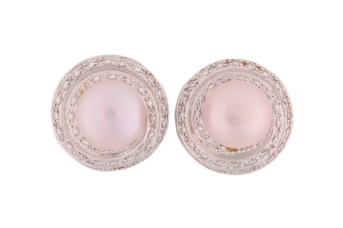 Lot 43 - A pair of pearl and diamond earrings; each...