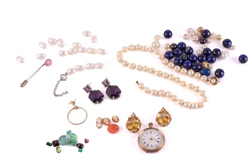 Lot 120 - A collection of gemstones and jewellery; to...