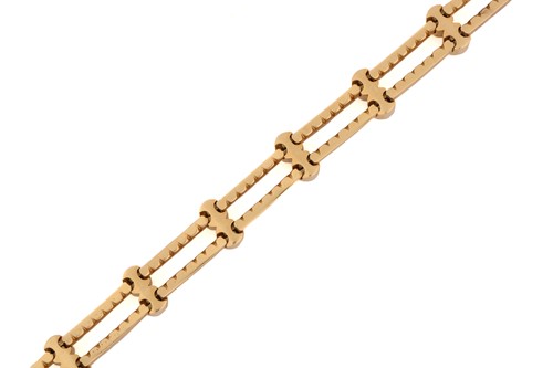 Lot 51 - A diamond-set bracelet, comprising two cords...
