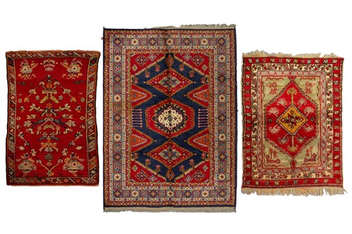 Lot 314 - A small North West Persian rd ground rug with...
