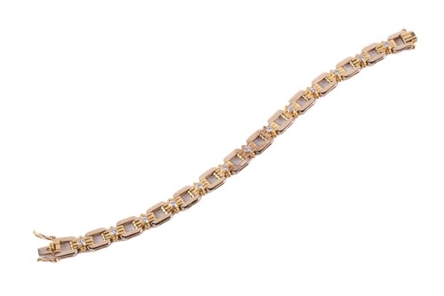 Lot 74 - A bi-coloured, diamond set, open link bracelet;...