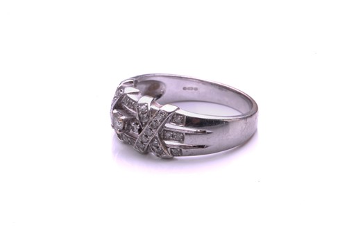 Lot 250 - A 9 carat white gold and diamond ring, the...