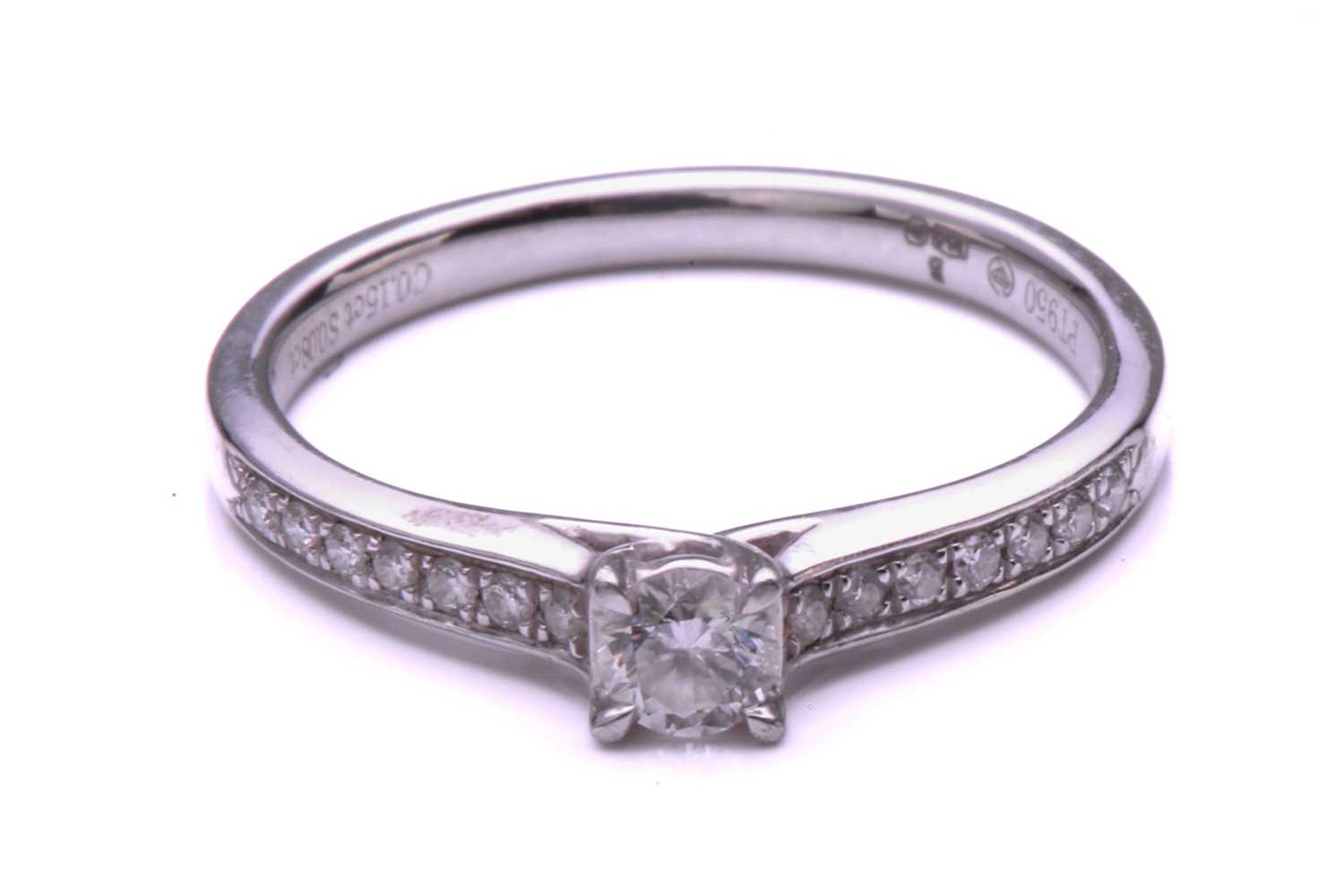 Lot 261 - A single stone diamond cross over ring; the