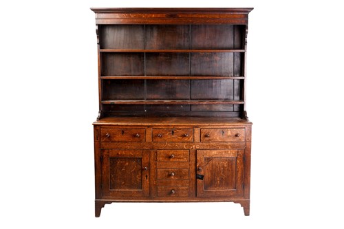 Lot 338 - An early 19th century Anglesey type oak and...