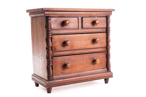 Lot 339 - A Victorian pitch pine miniature chest of...