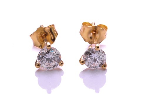 Lot 192 - A pair of diamond earrings, each comprising a...