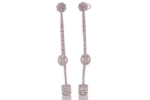 Lot 144 - A pair of 18 carat white gold and diamond...