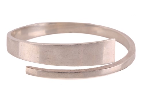 Lot 338 - A Georg Jensen bangle designed by Hans Hansen,...