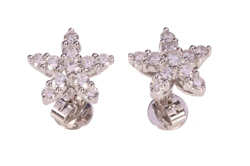 Lot 221 - A pair of French diamond cluster earrings;...