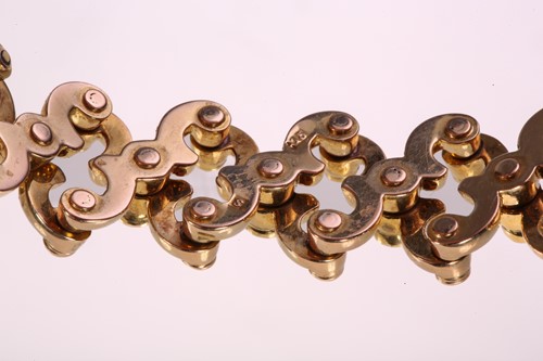Lot 217 - A gem-set expandable bracelet, each link...