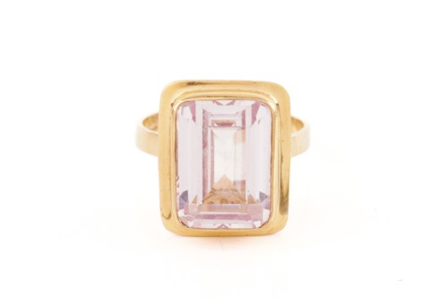 Lot 302 - A synthetic pink sapphire ring, comprising a...